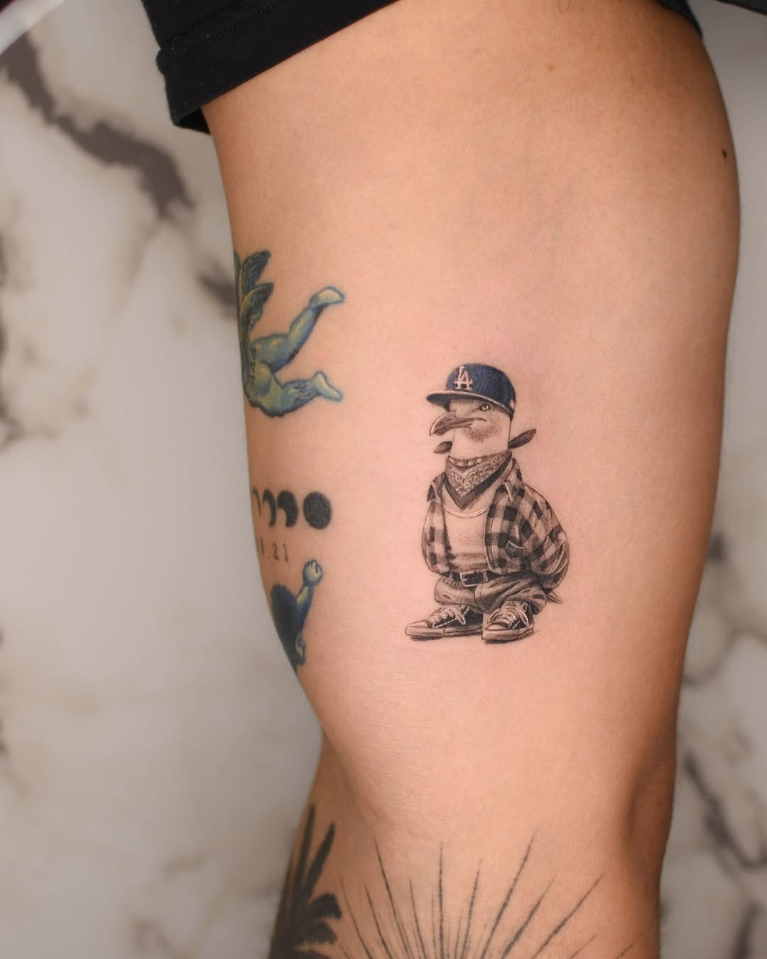 Unique seagull tattoo with urban flair Tattoo Design