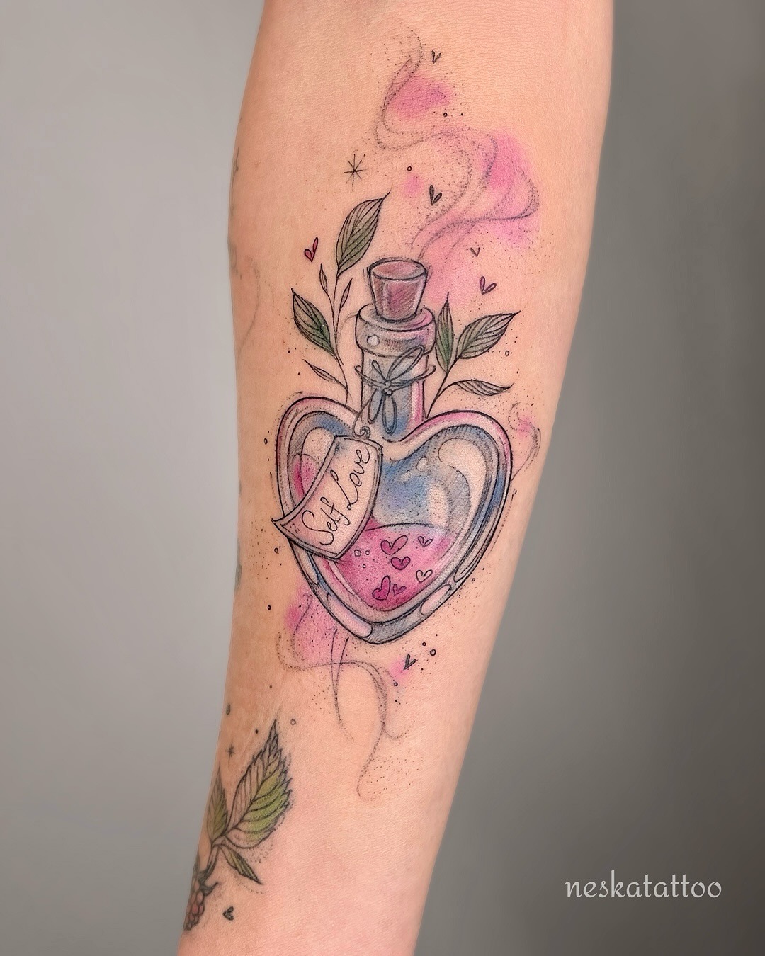 A colorful heart-shaped potion for self-love Tattoo Design