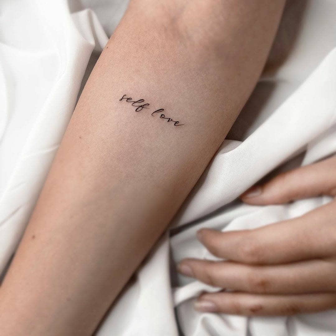 Elegant Script of Self Love on Skin Tattoo Design
