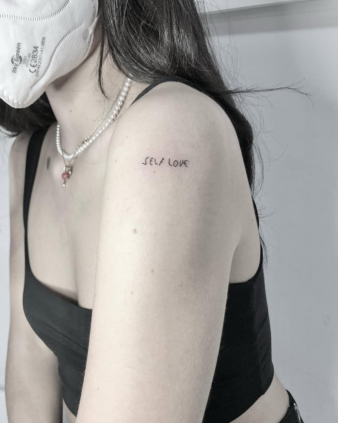 Minimalist self-love tattoo on the shoulder Tattoo Design
