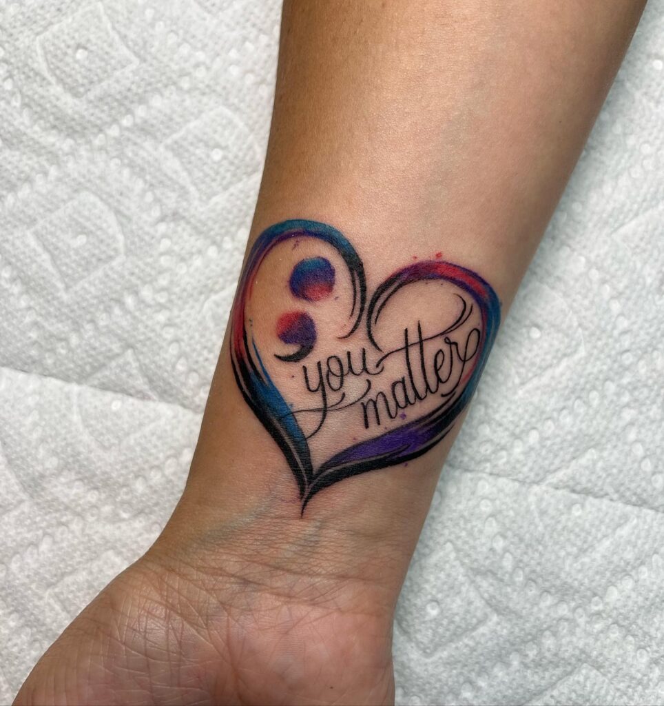 “Begin Again” Wrist Tattoo with Semi-Colon Symbol Tattoo Design