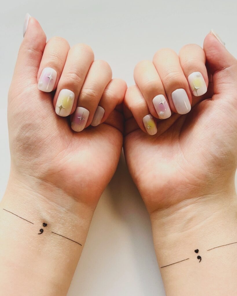Minimalist Heart and Semi-Colon Tattoo on the Hand Tattoo Design