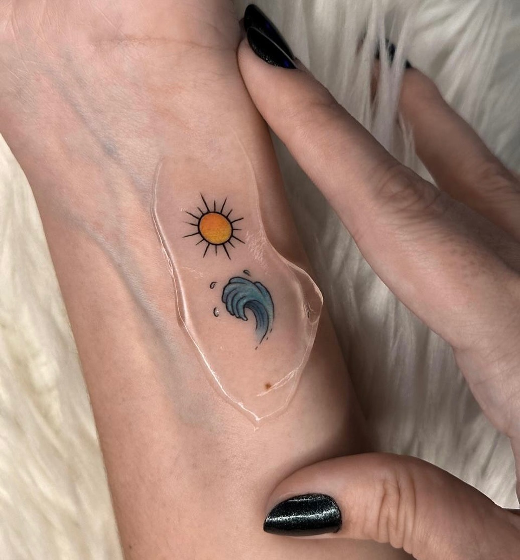 Bright waves and sunshine in a tattoo Tattoo Design