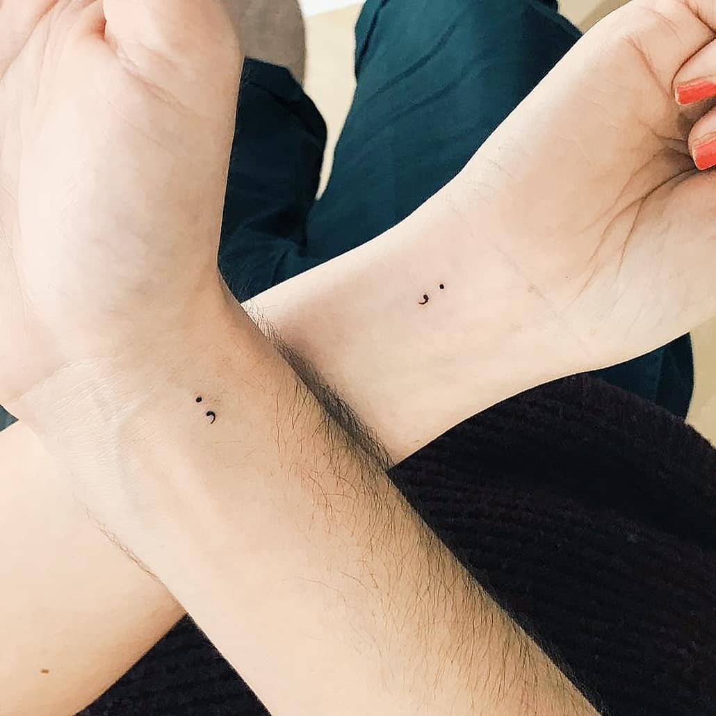 Elegant minimalist semicolon tattoos on wrists Tattoo Design