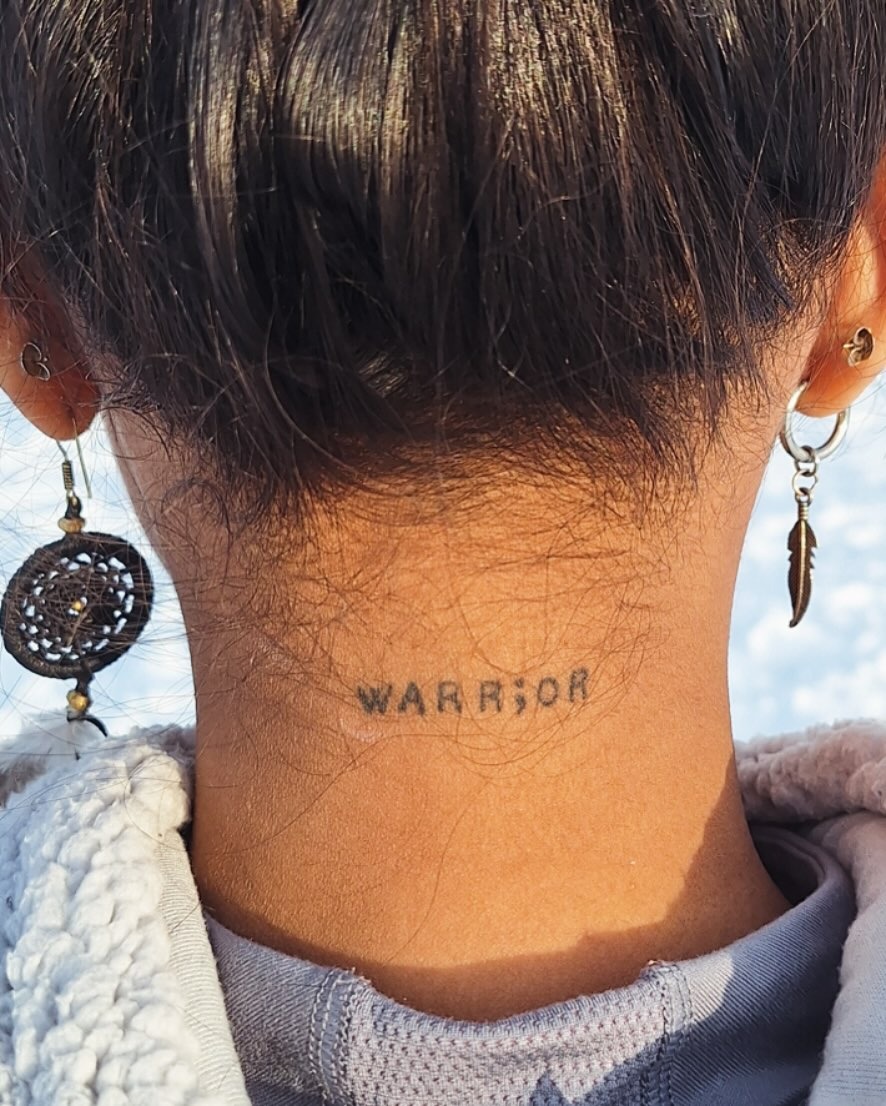 Empowerment symbol in a bold tattoo design Tattoo Design