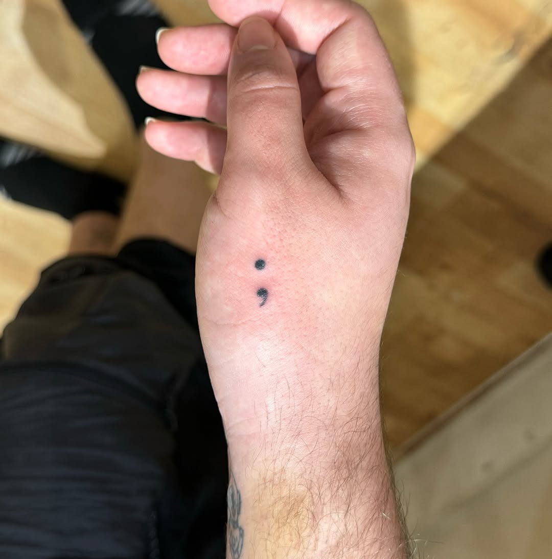 Meaningful semicolon tattoo on wrist Tattoo Design