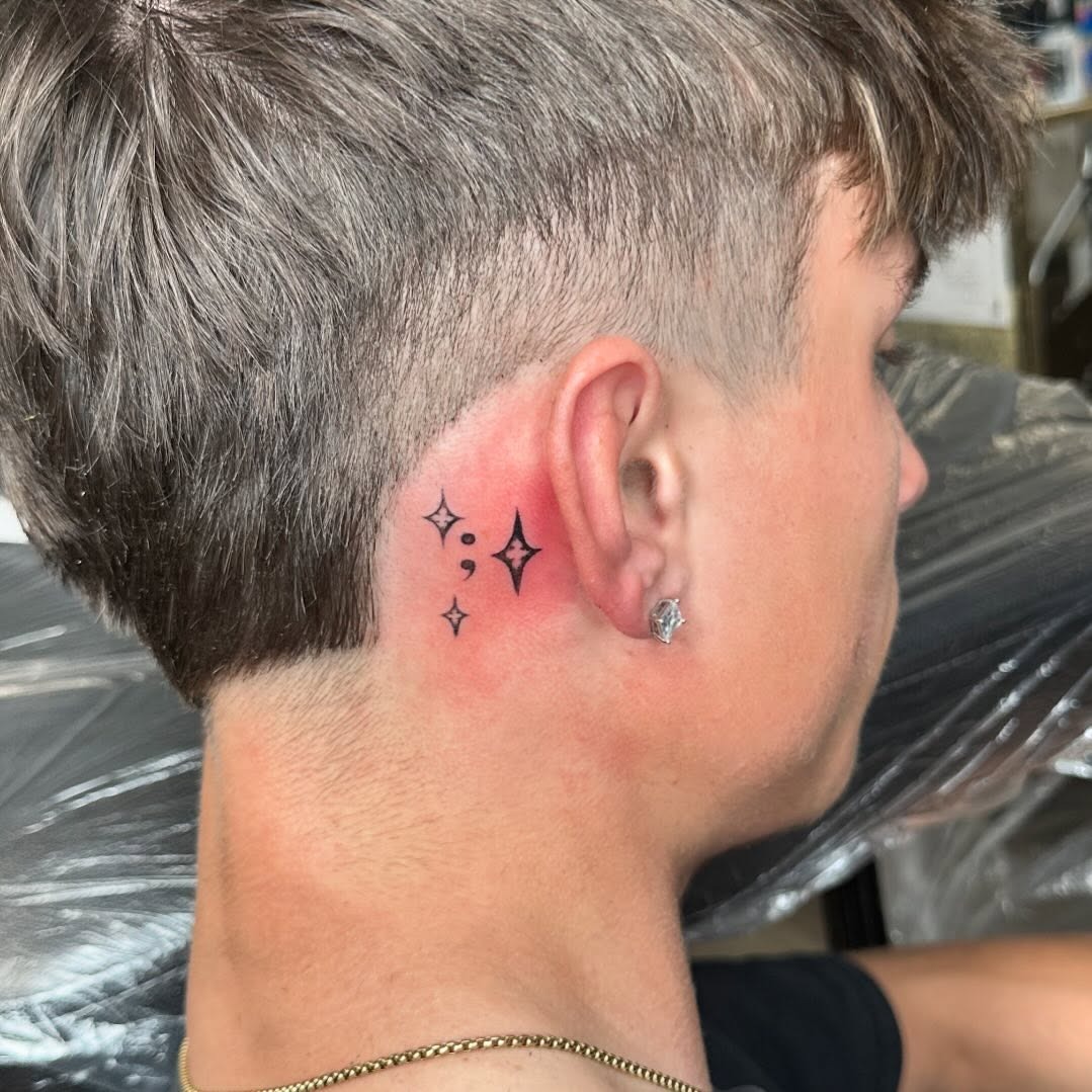 Unique semicolon tattoo with sparkling accents Tattoo Design