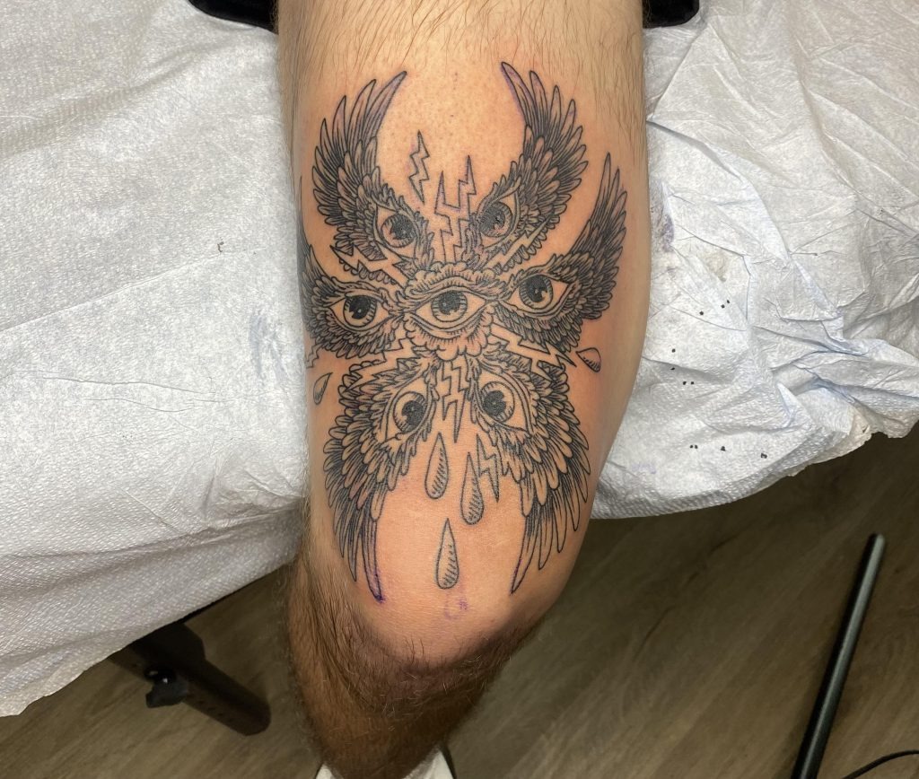 Winged Eye Chest Design Tattoo Design