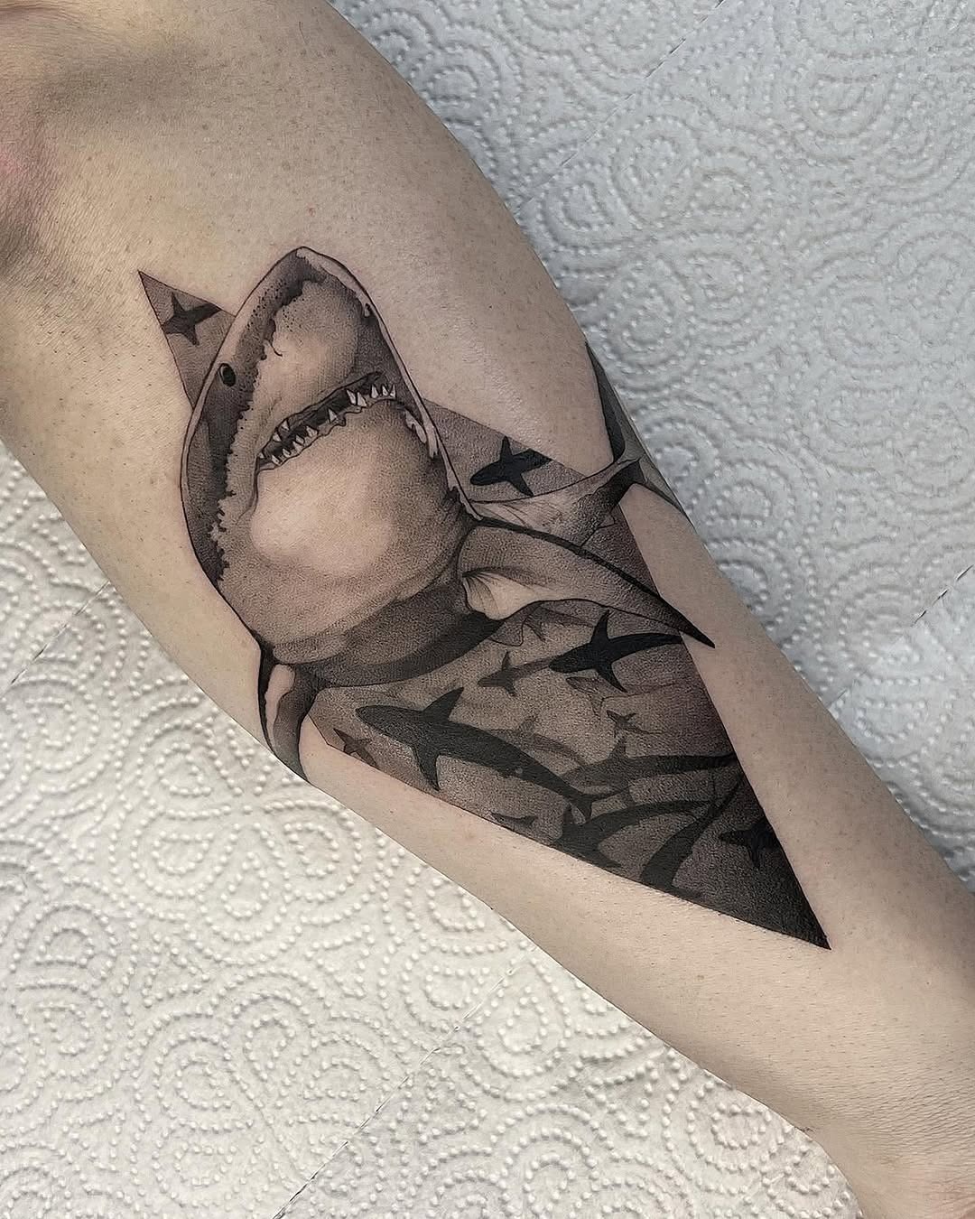 Bold Shark Tattoo with Artistic Elements Tattoo Design