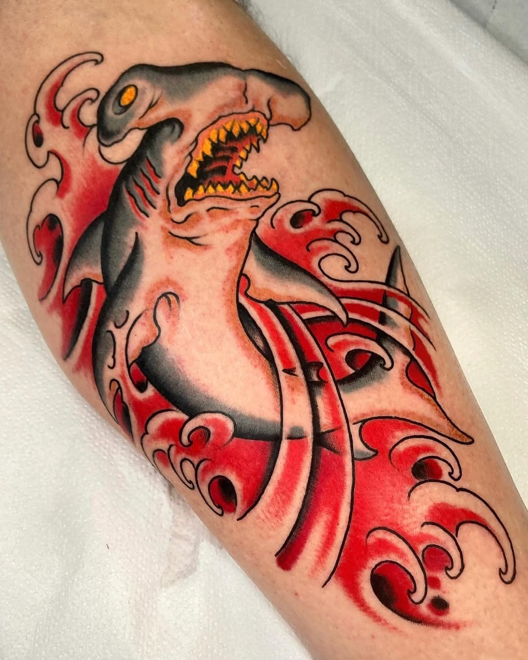 Bold shark tattoo with dramatic wave details Tattoo Design