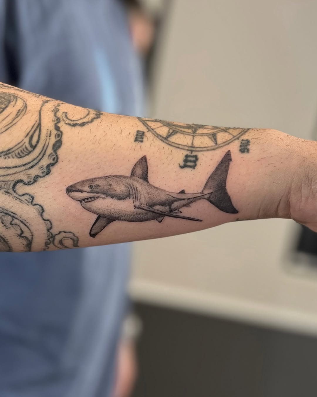 Dynamic Grey Shark Tattoo on Forearm Tattoo Design