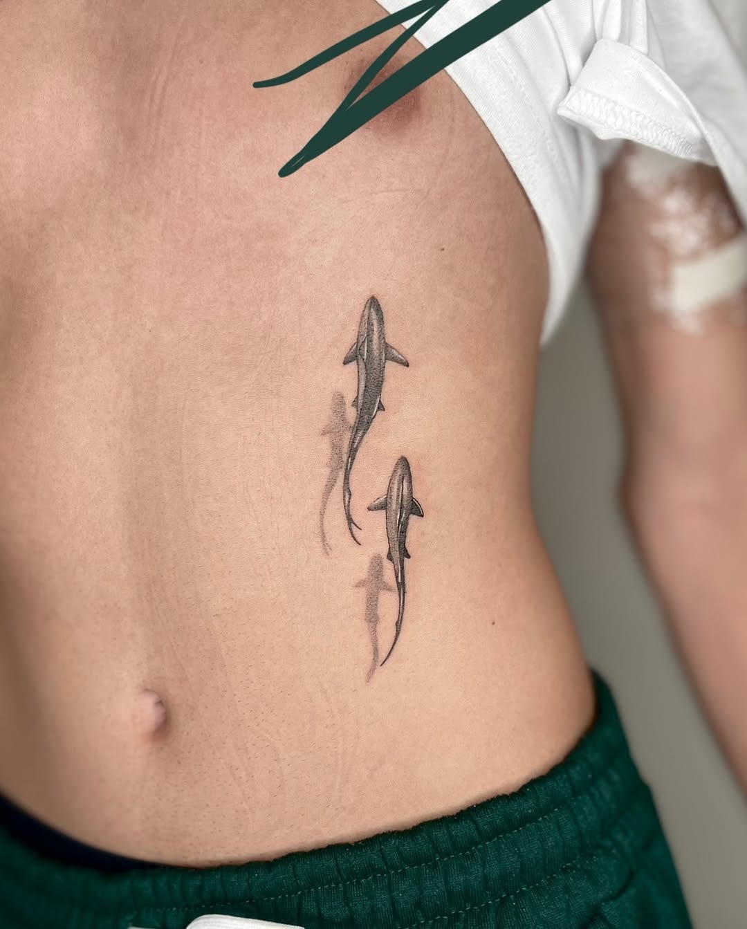 Minimalist Shark Tattoos on Ribs Tattoo Design