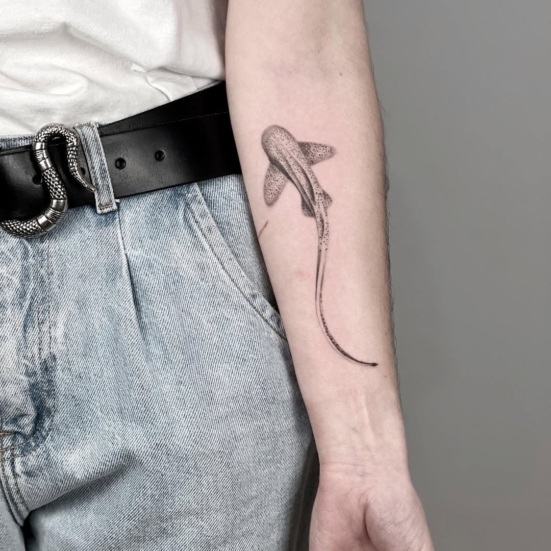 Realistic shark tattoo captures oceanic elegance Tattoo Design