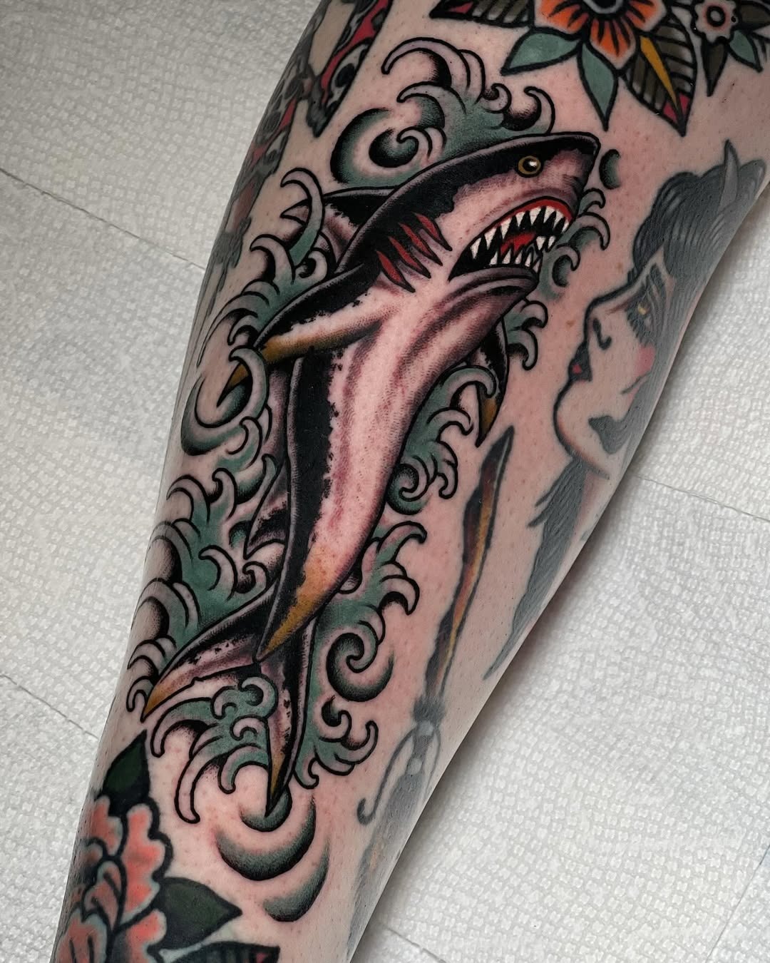 Stunning Shark Tattoo with Floral Accents Tattoo Design