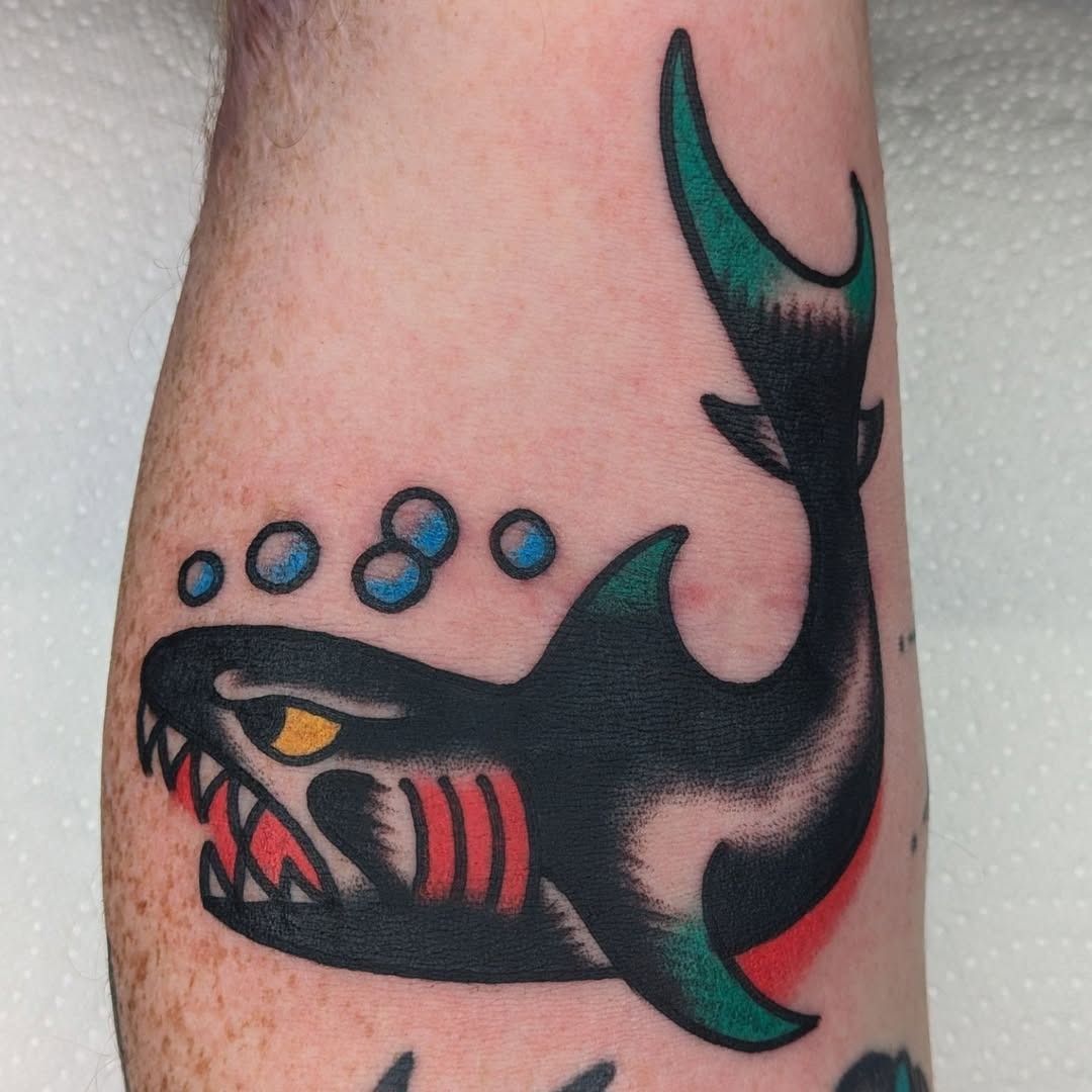 Stylish shark tattoo with vibrant colors Tattoo Design