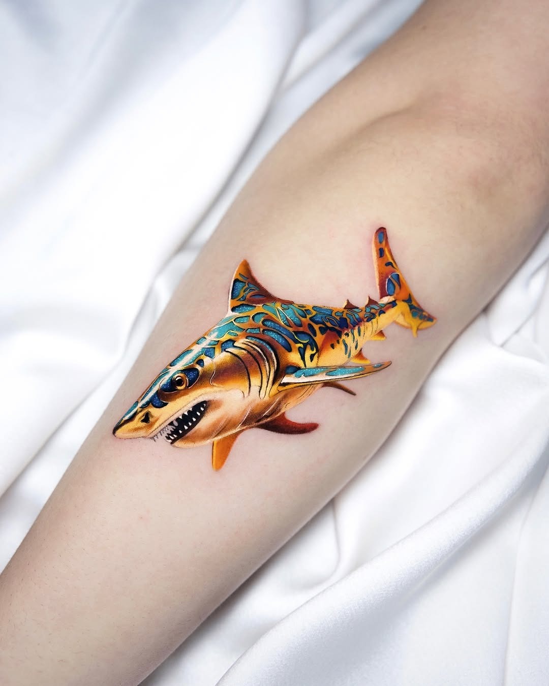 Vibrant shark tattoo with intricate details Tattoo Design