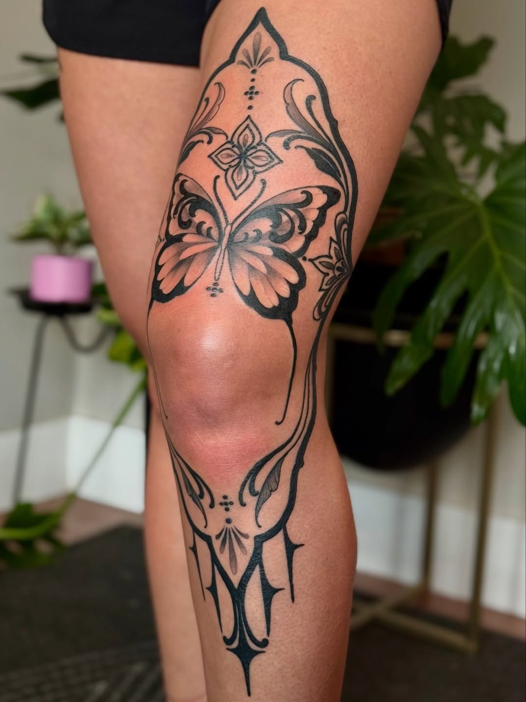 Elegant butterfly with intricate floral motifs Tattoo Design