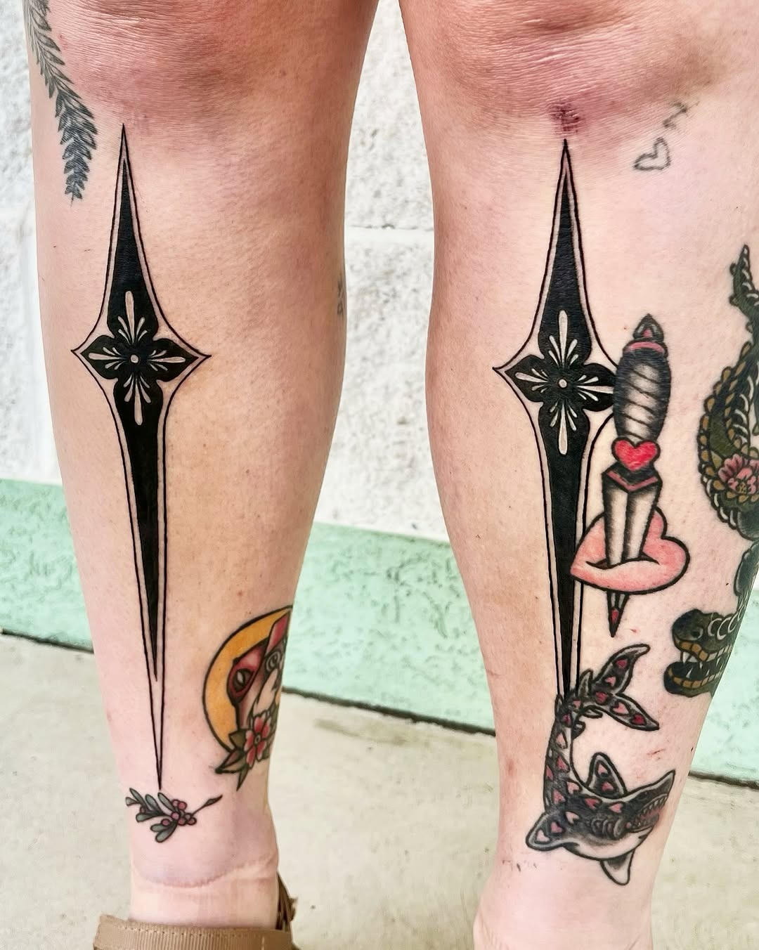 Stylish blackwork designs for shin tattoos Tattoo Design