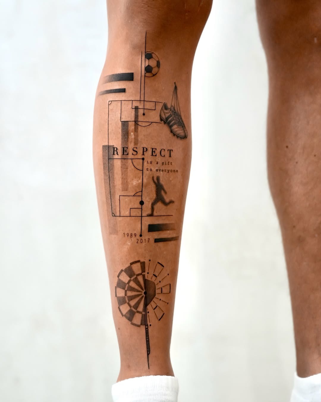 Symbolic and modern shin tattoo design Tattoo Design