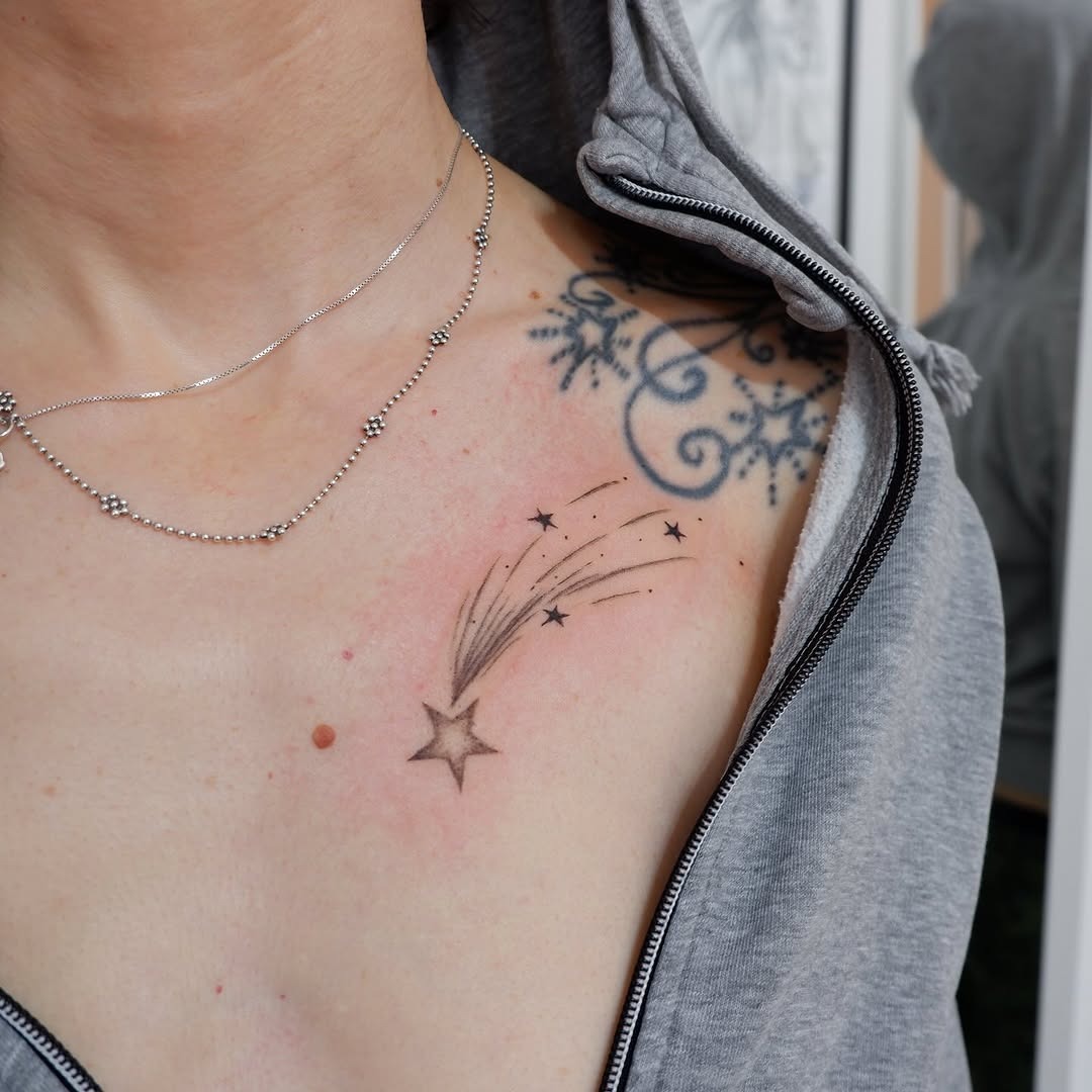 Captivating shooting star tattoo on the shoulder Tattoo Design