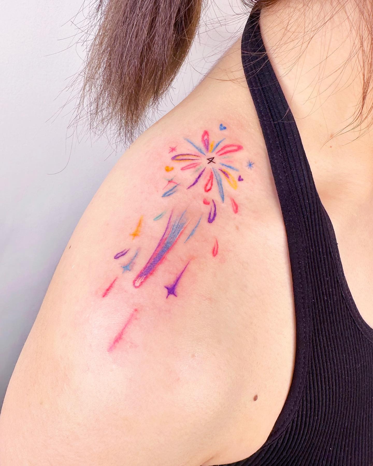 Colorful Shooting Star Tattoo Design on Shoulder Tattoo Design