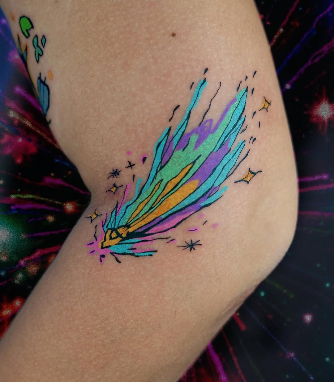 Colorful shooting star tattoo with vibrant hues Tattoo Design