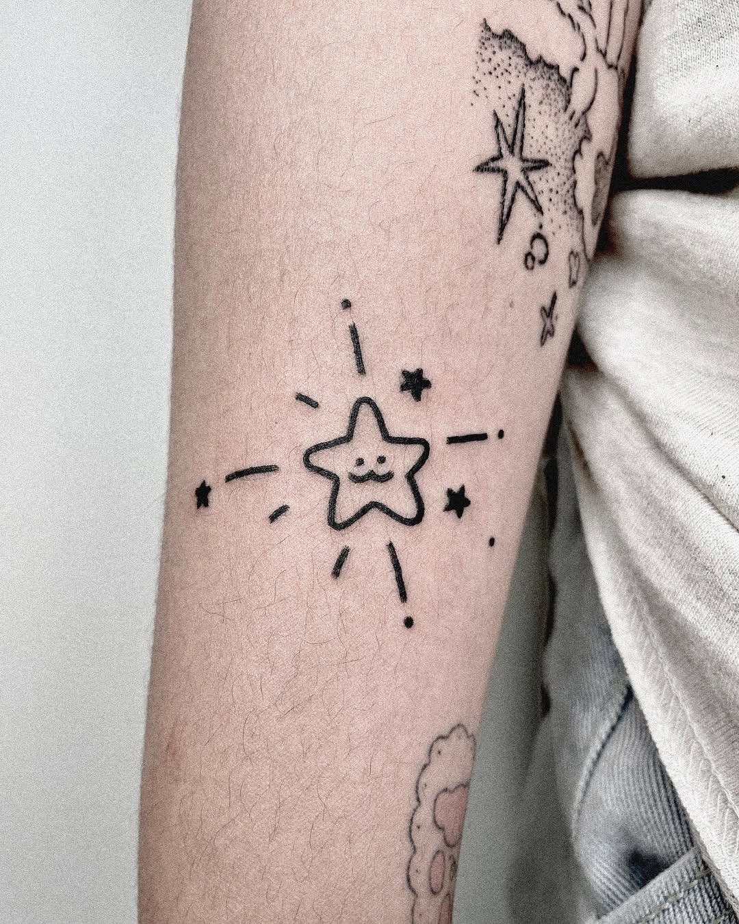 Delicate shooting star tattoo on forearm Tattoo Design