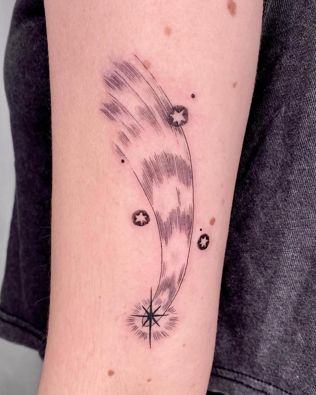 Dynamic and whimsical shooting star tattoo design Tattoo Design