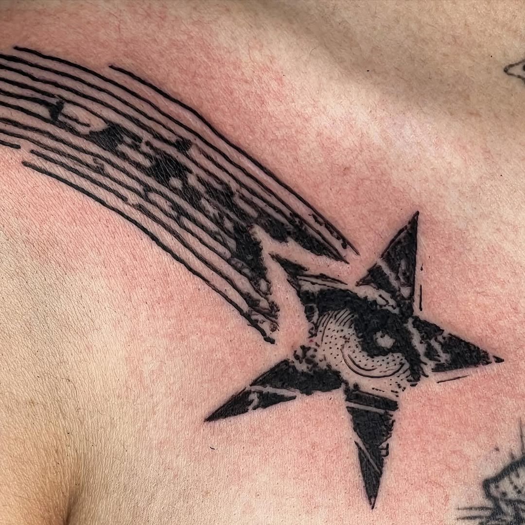 Elegant shooting star tattoo with spiral design Tattoo Design