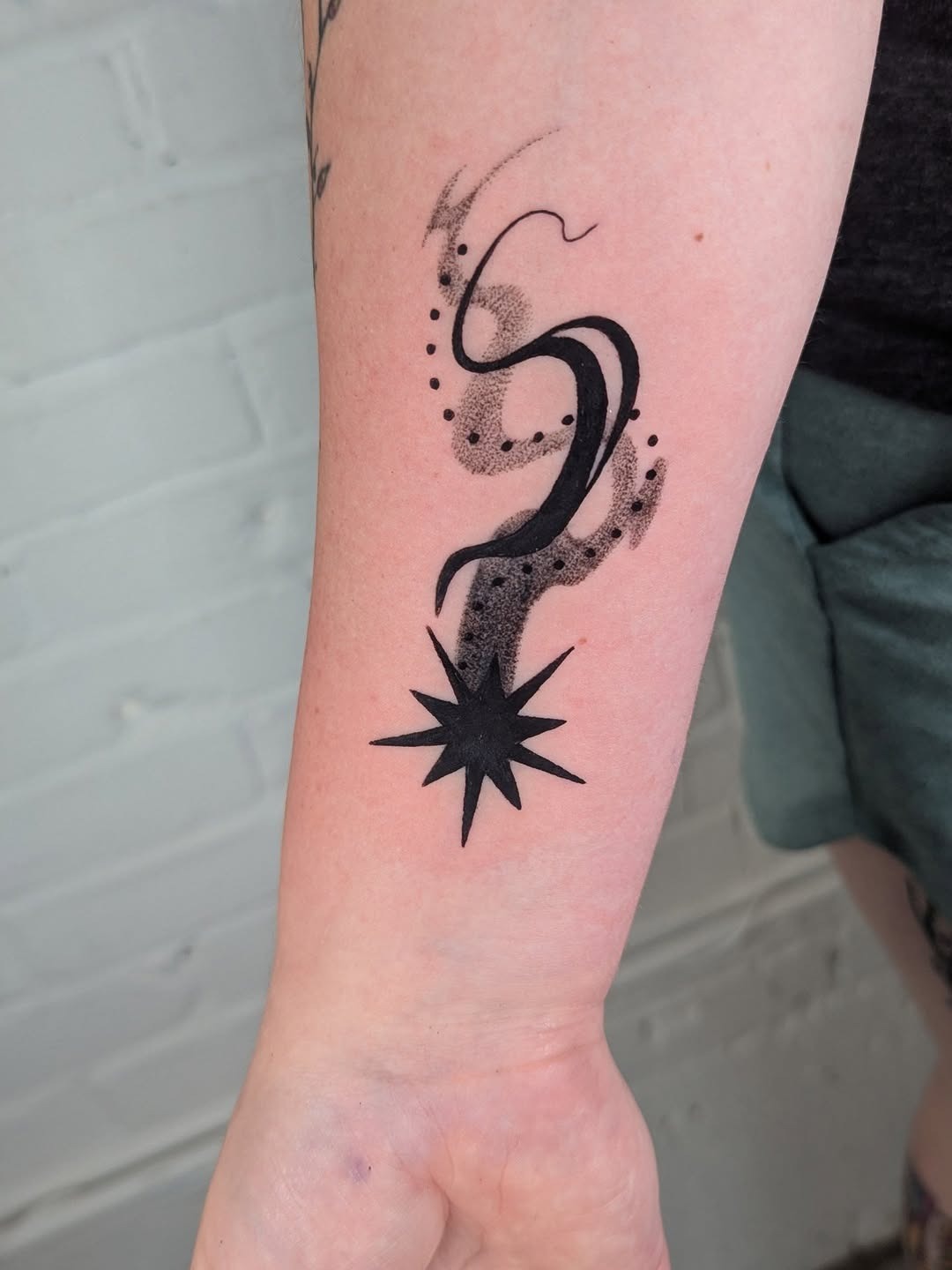Minimalist Shooting Star Tattoo on Arm Tattoo Design