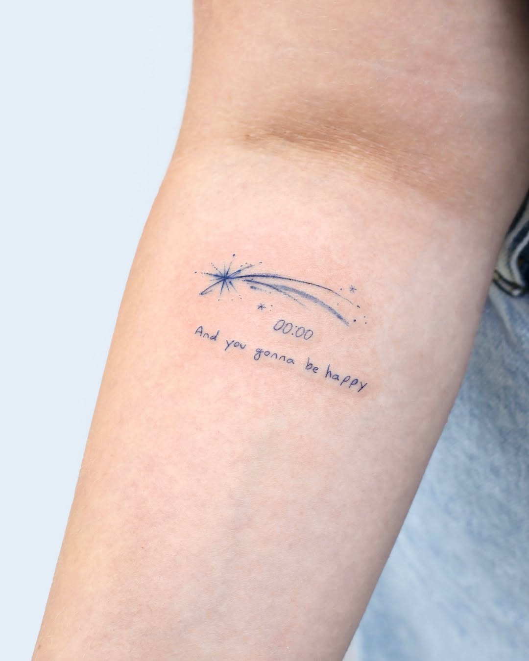 Minimalist shooting star tattoo with a quote Tattoo Design