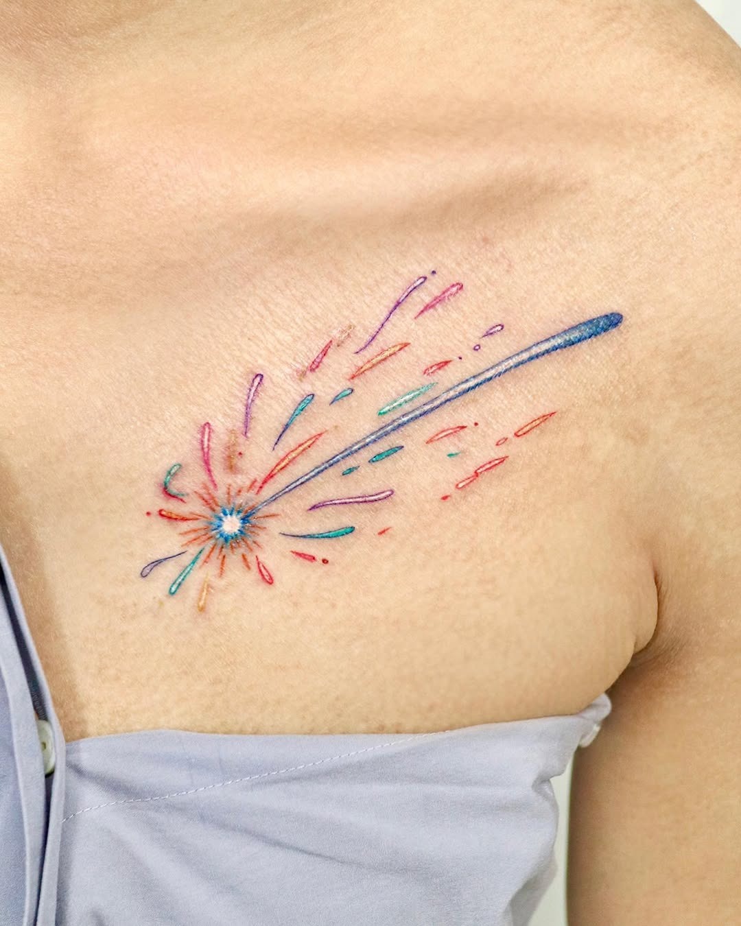 Vibrant shooting star tattoo with colorful trails Tattoo Design