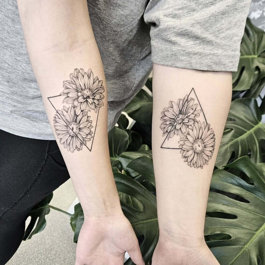 Matching Daisy Tattoos with Geometric Triangle Tattoo Design