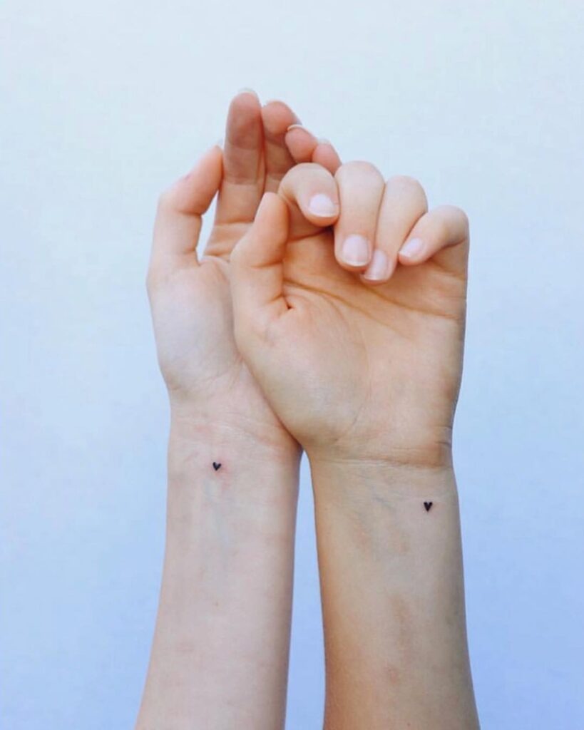 Tiny Matching Heart Tattoos for Siblings Tattoo Design