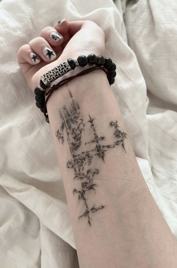 Crescent Cross Rib Sigil Tattoo Design