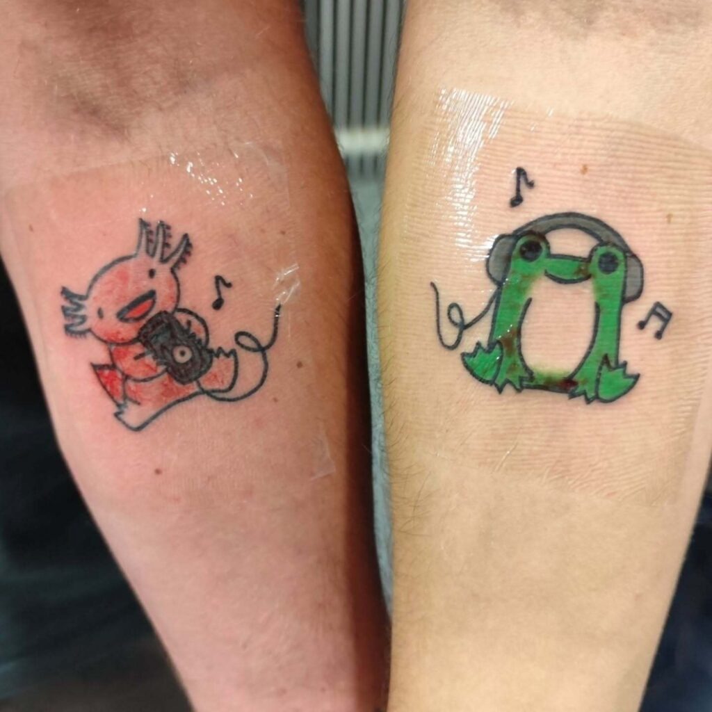 Music-Loving Axolotl and Frog Tattoos Tattoo Design
