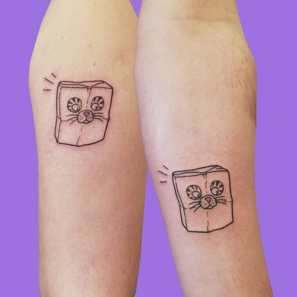 Playful Cat in a Paper Bag Matching Tattoos Tattoo Design