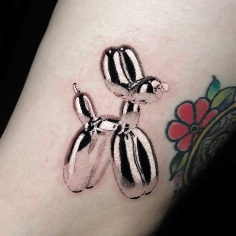 Charming balloon dog in gleaming silver ink Tattoo Design