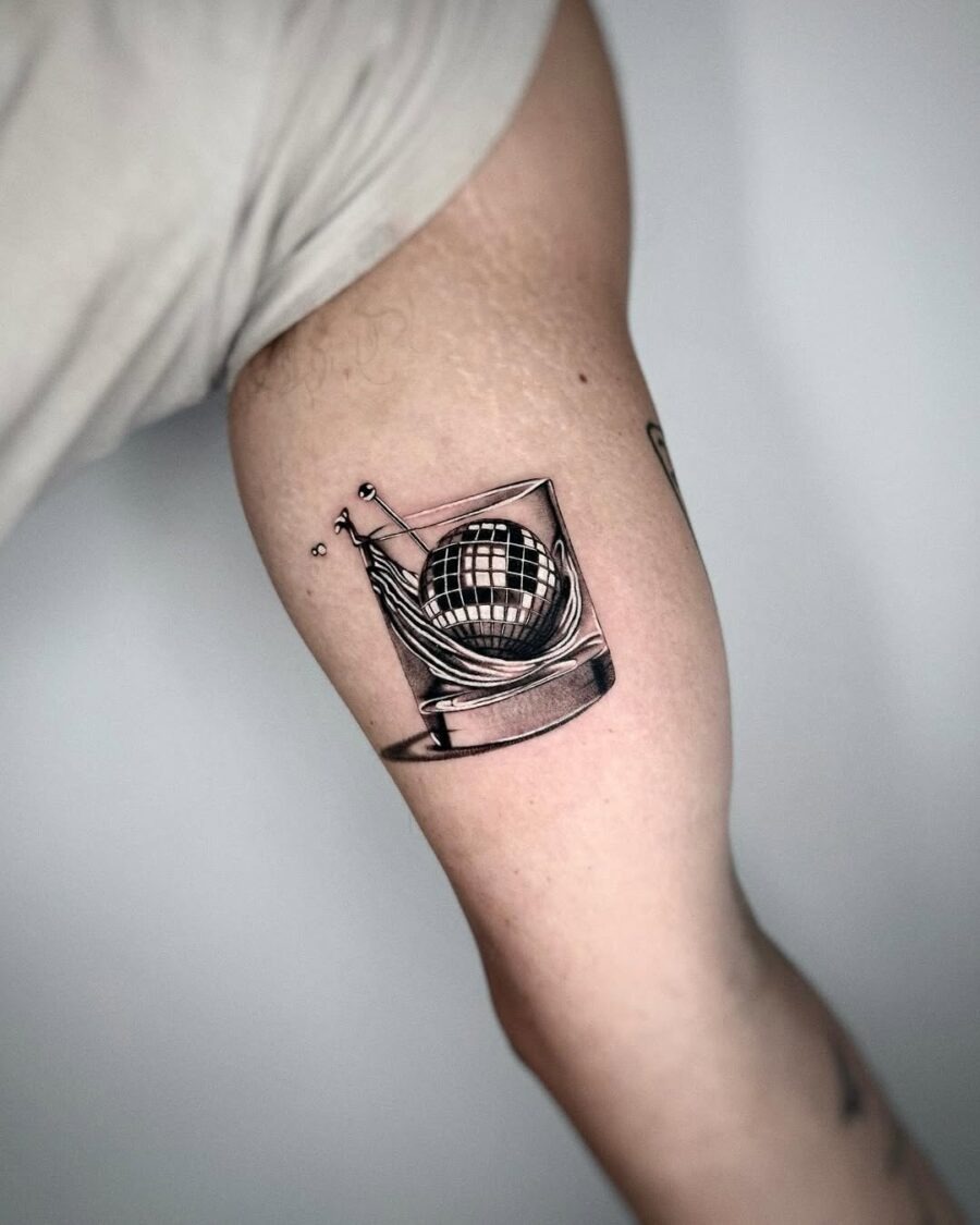 Distinctive Silver Ink Tattoo of a Splashing Glass Tattoo Design