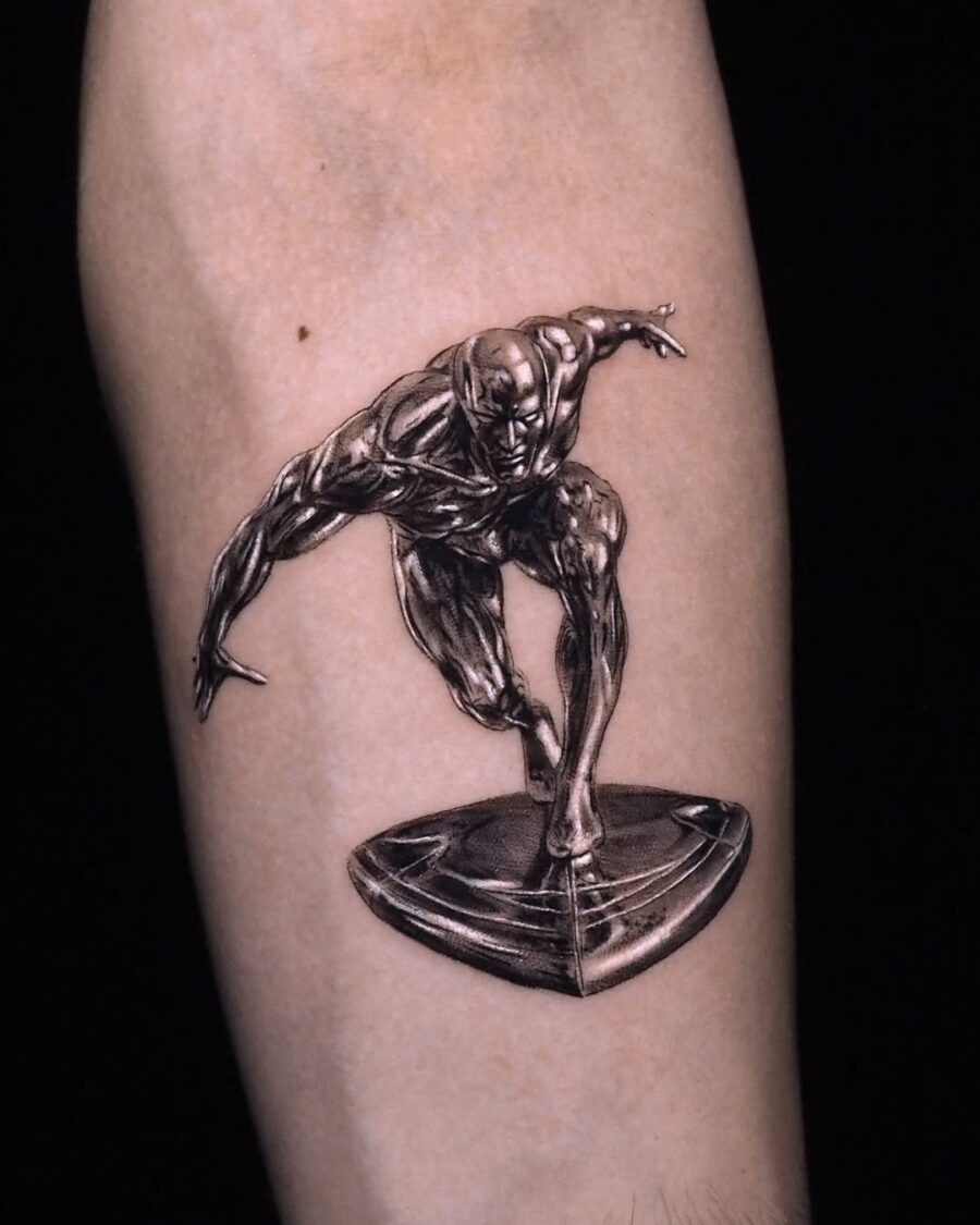Dynamic silver ink tattoo of a skateboarder Tattoo Design