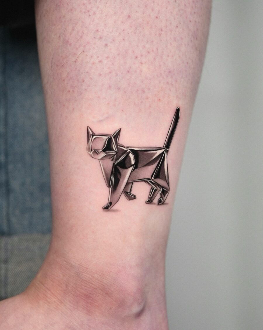 Elegant cat tattoo in silver ink design Tattoo Design