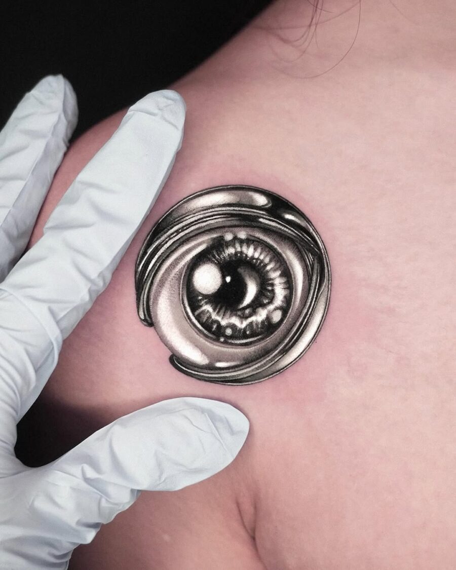 Intricate silver ink eye tattoo design Tattoo Design