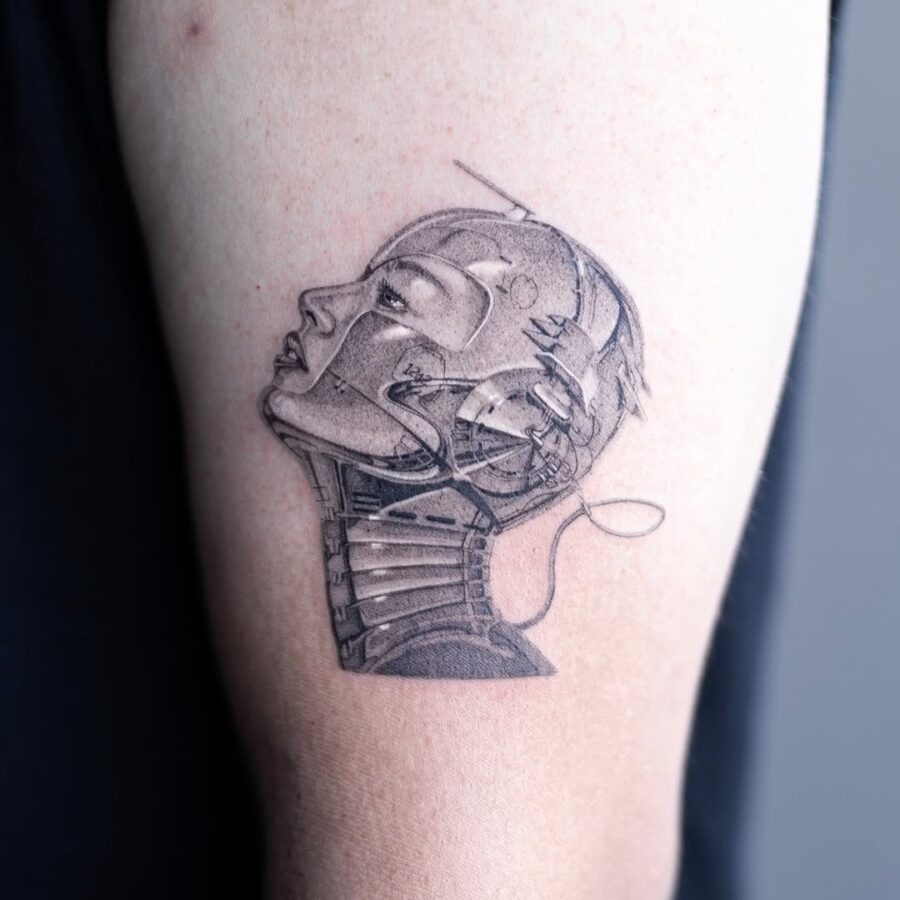 Intricate silver ink robot face design Tattoo Design