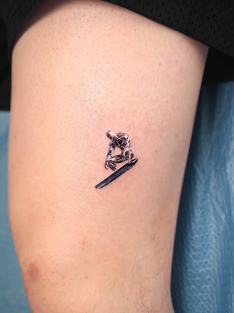 Intricate silver ink surfing skeleton tattoo design Tattoo Design