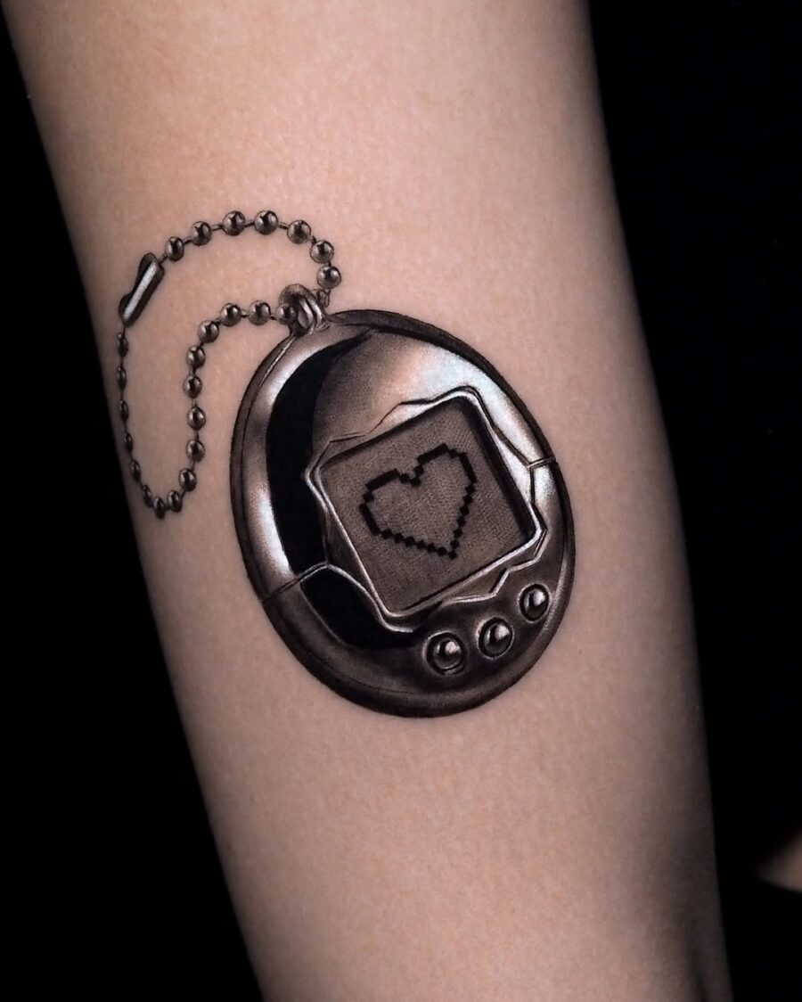 Playful nostalgia captured in silver ink tattoo Tattoo Design