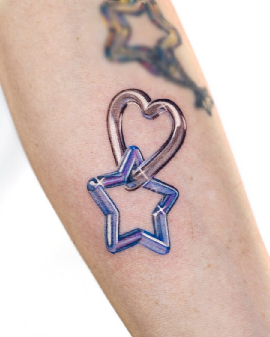 Playful silver ink heart and star tattoo Tattoo Design