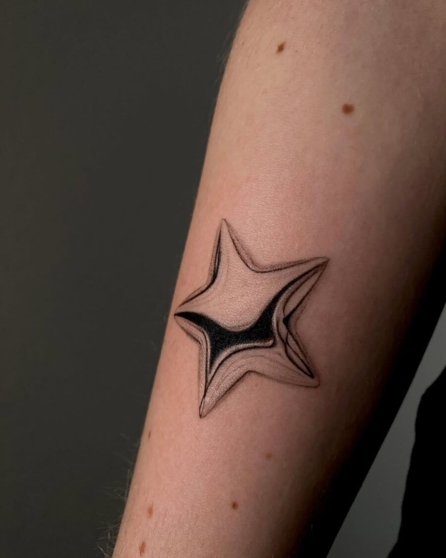 Stunning silver star tattoo on forearm Tattoo Design