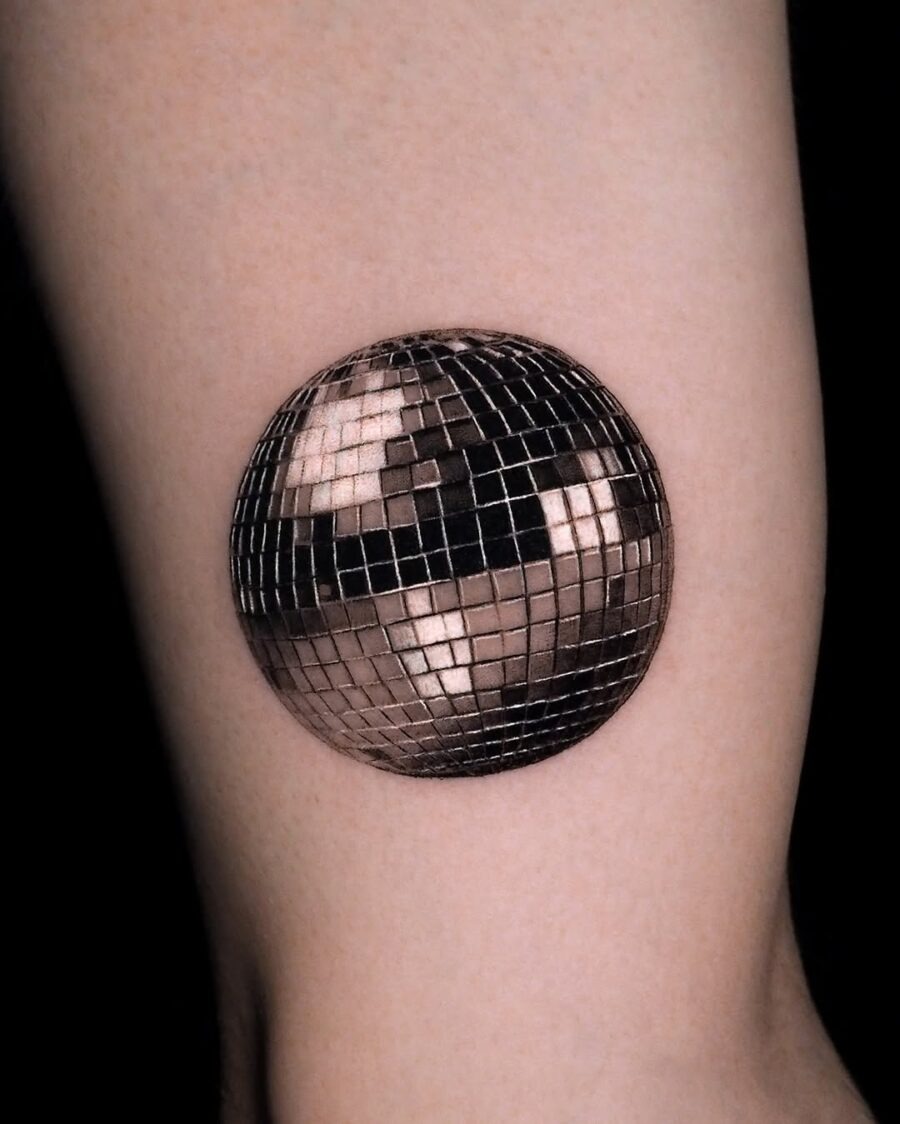 Stylish silver ink disco ball tattoo Piece Tattoo Design