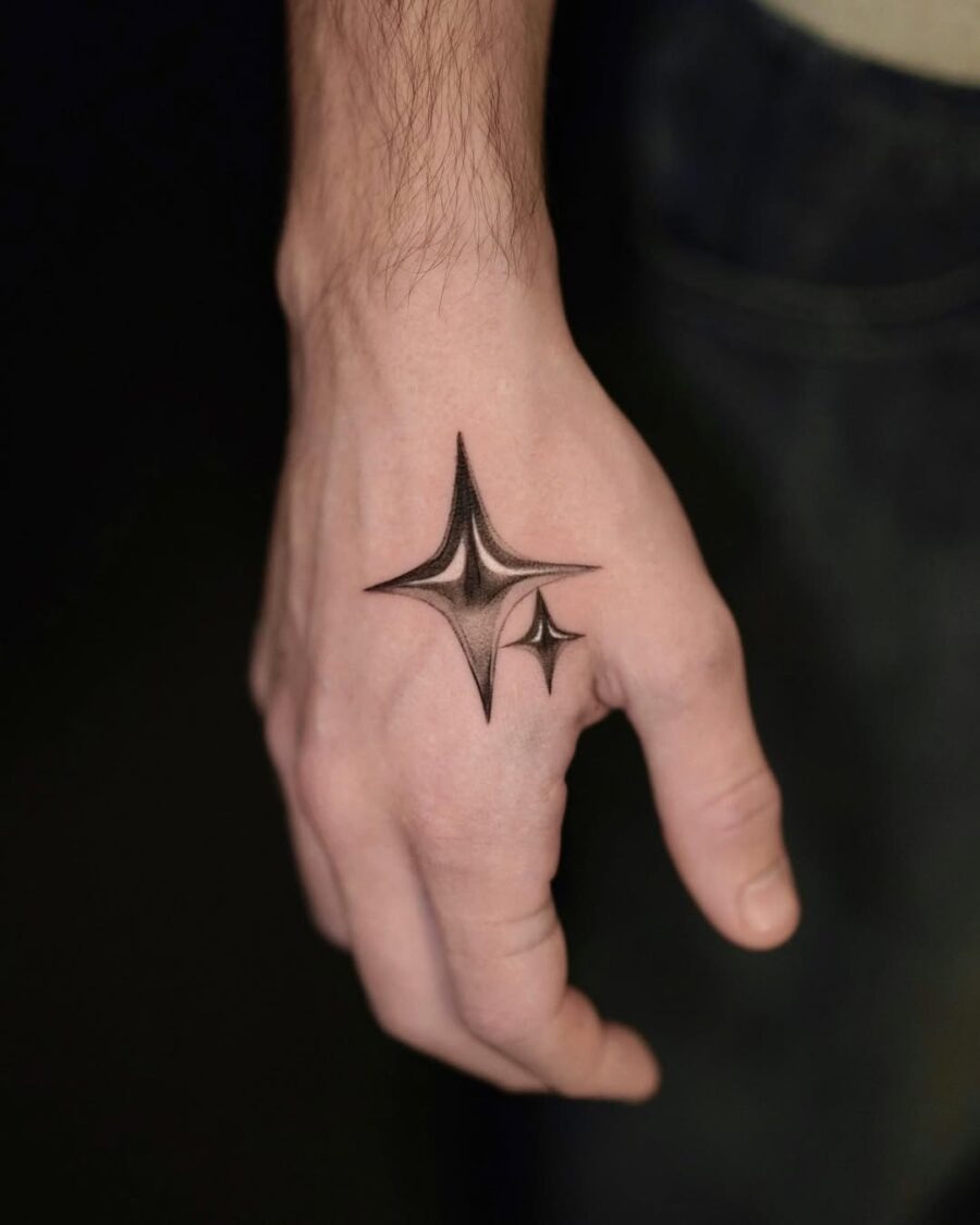 Stylish silver ink star tattoo on hand Tattoo Design