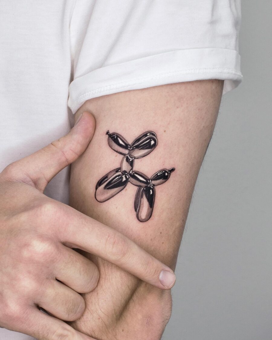 Unique silver ink balloon dog tattoo design Tattoo Design